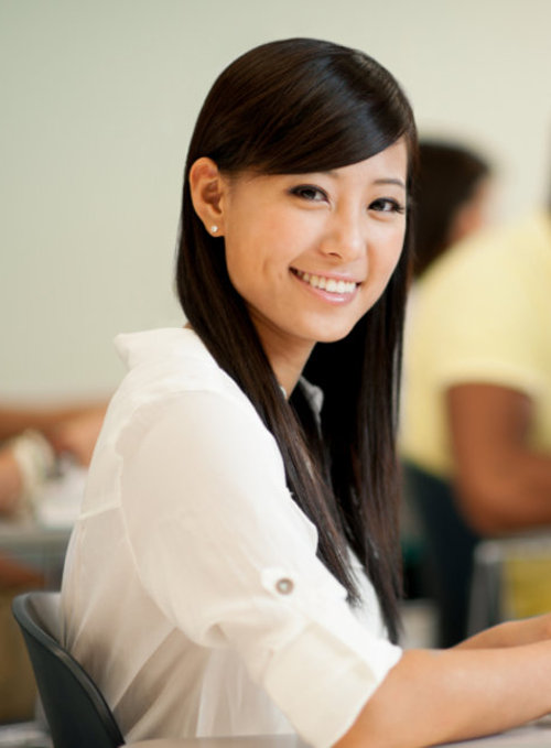 a Chinese teenager studying in a classroom